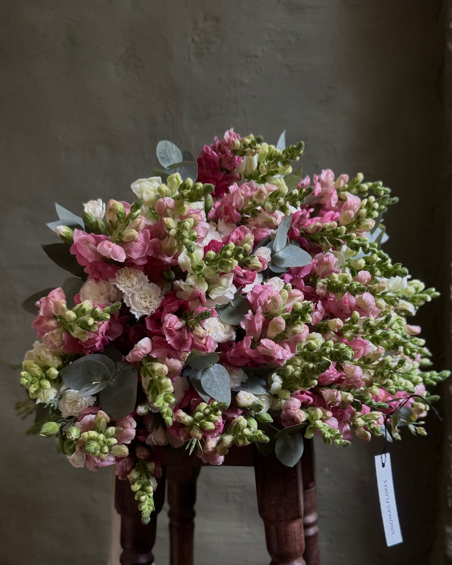 Hand-tied big bright bouquet with antirrhinums