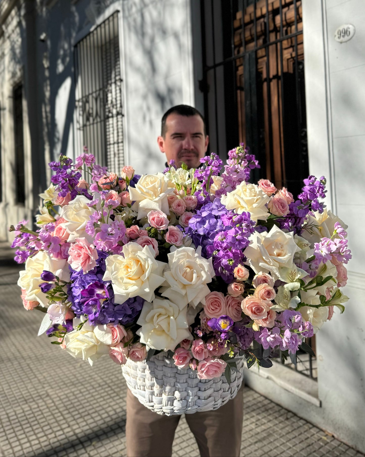 Flower arrangement white & purple in a basket LUX