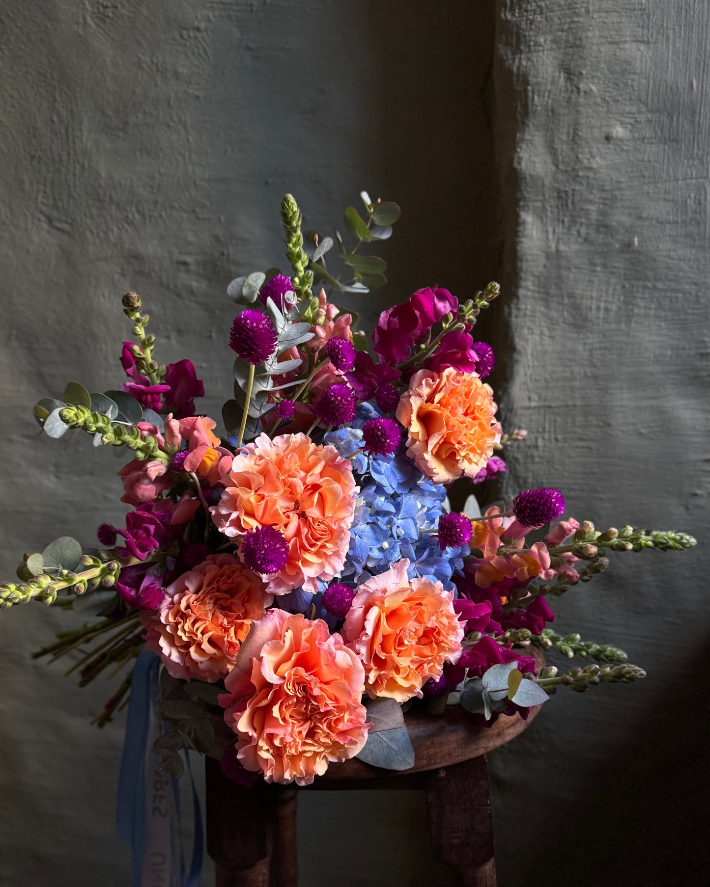 Hand-tied bright colorful mixed flower bouquet