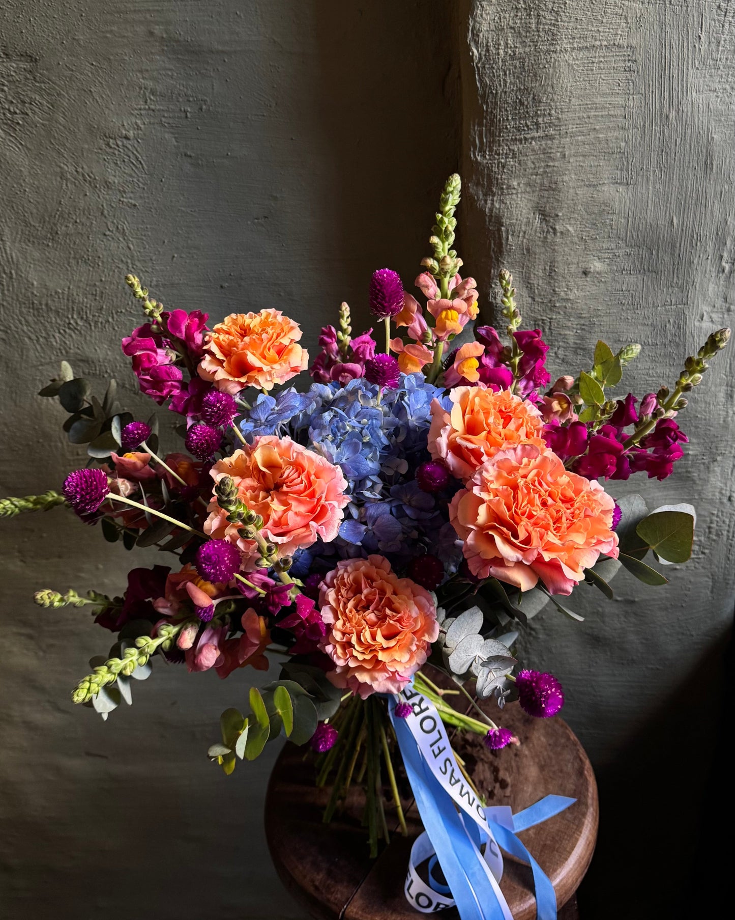 Hand-tied bright colorful mixed flower bouquet