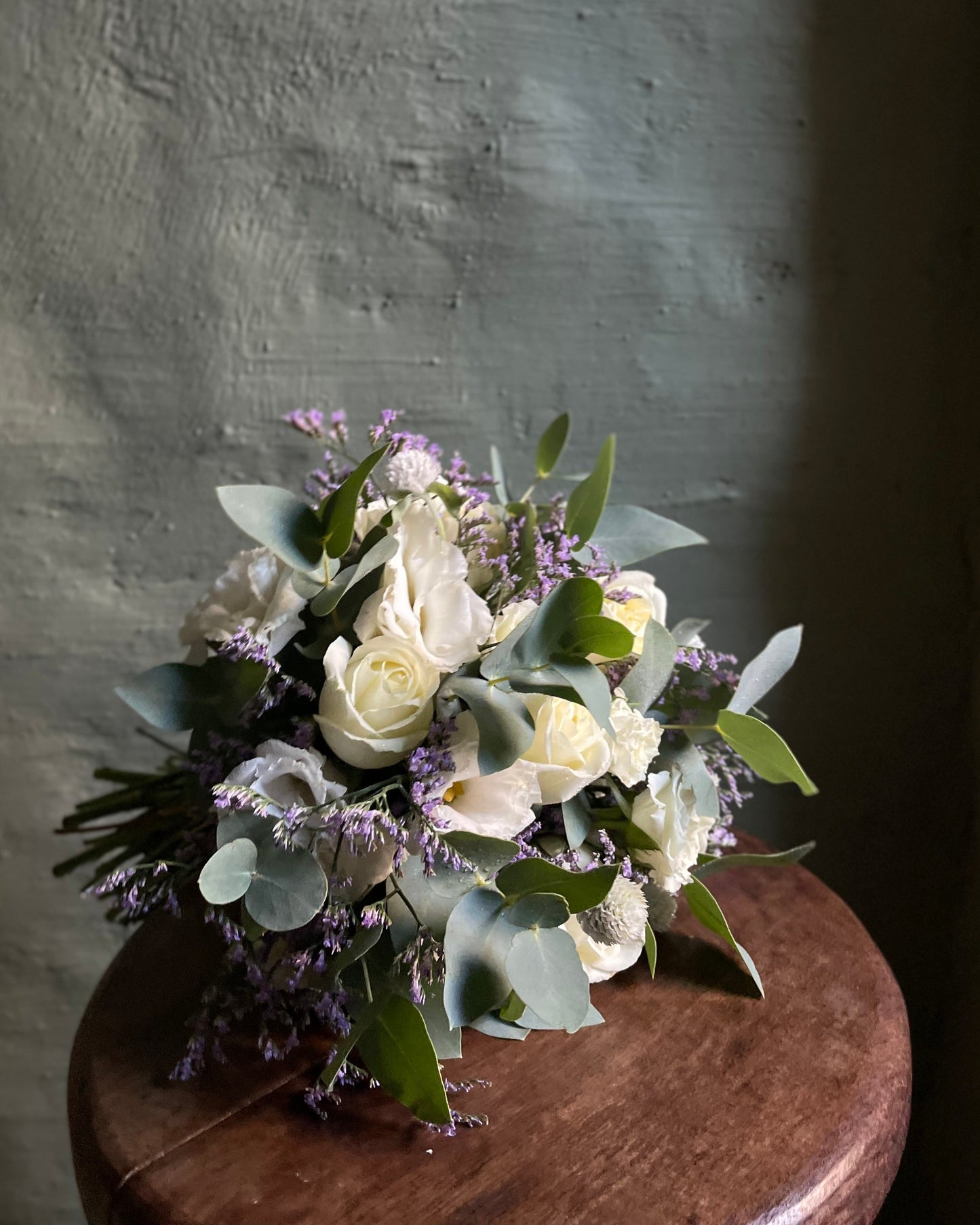 Bridal white & green bouquet with roses & eucalyptus