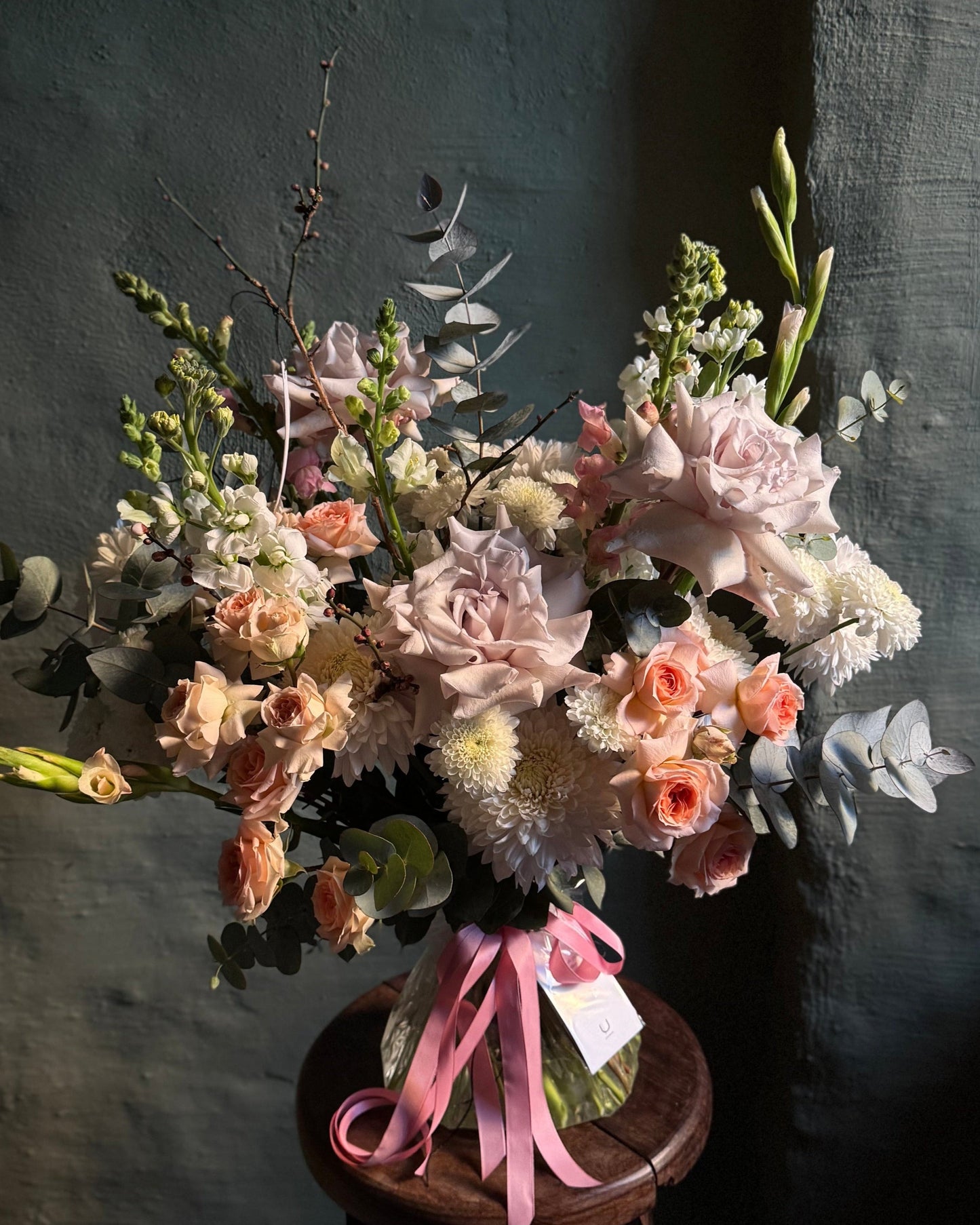 Hand-tied pastel mixed flower bouquet with Ecuadorian and spray roses