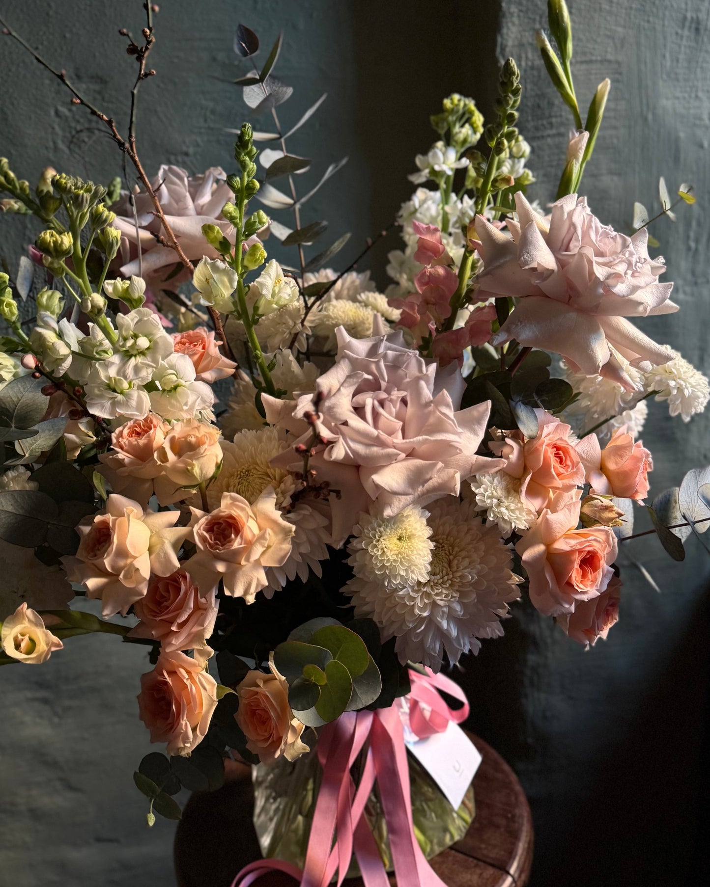 Hand-tied pastel mixed flower bouquet with Ecuadorian and spray roses