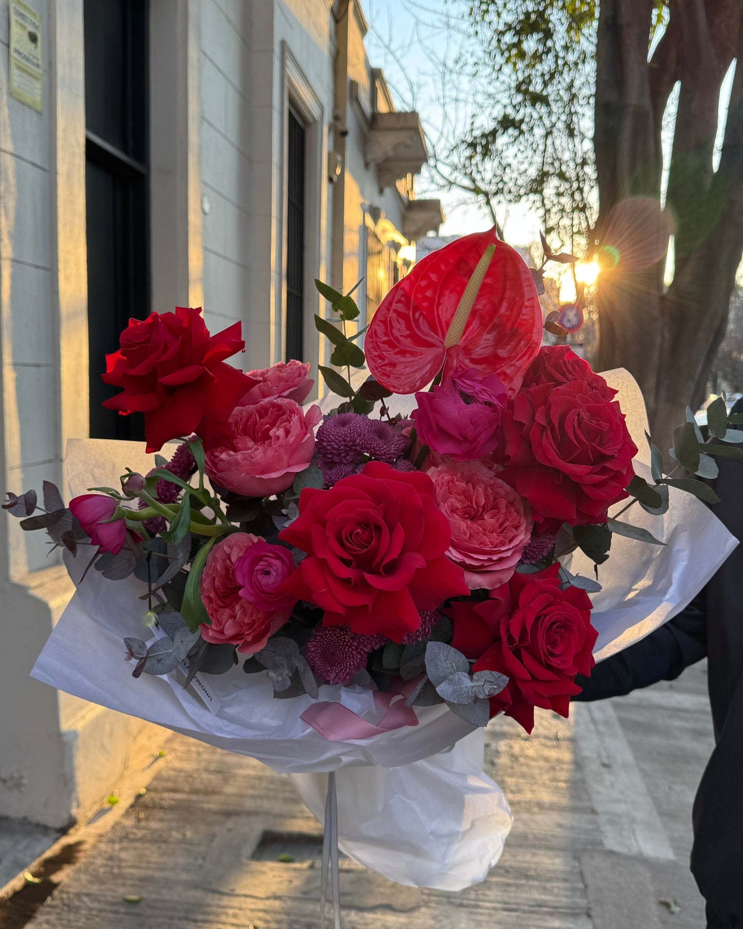 Hand-tied bright red & pink bouquet with anthurium