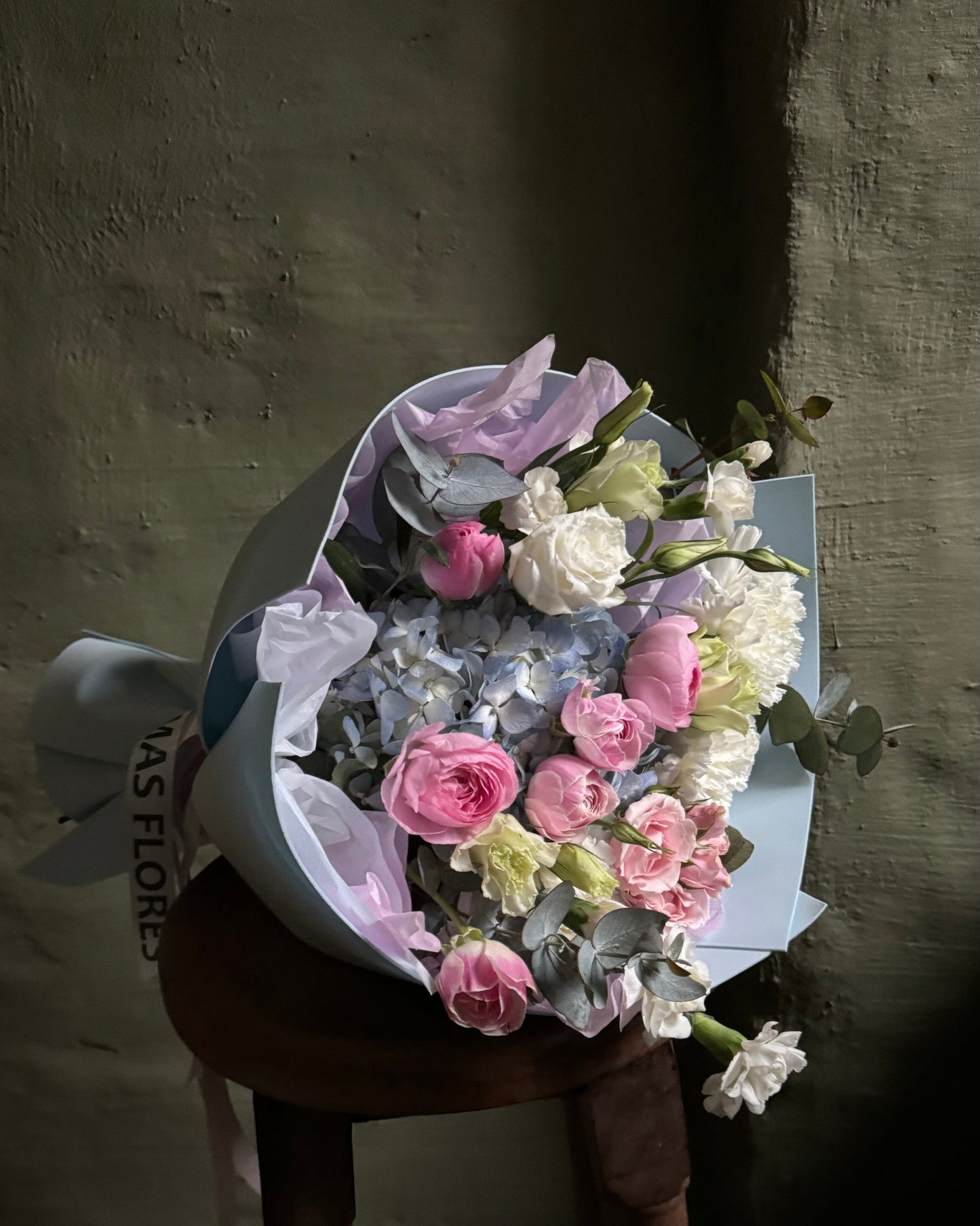 Bouquet mixed flower gentle with ranunculus gift wrapped