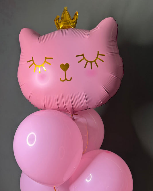 Foil balloon big pink cat in a company of pink latex balloons with helium in various colors
