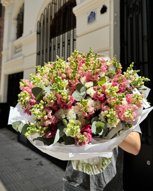 Big bright bouquet with antirrhinums hand-tied