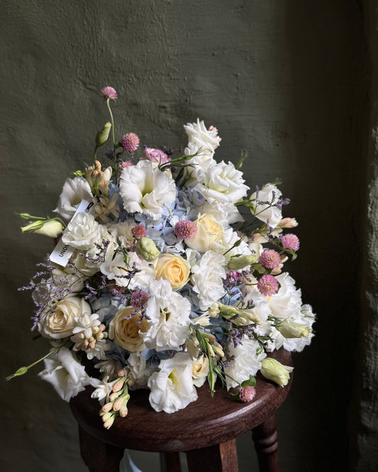 White & blue delicate mixed flower bouquet with hydrangeas