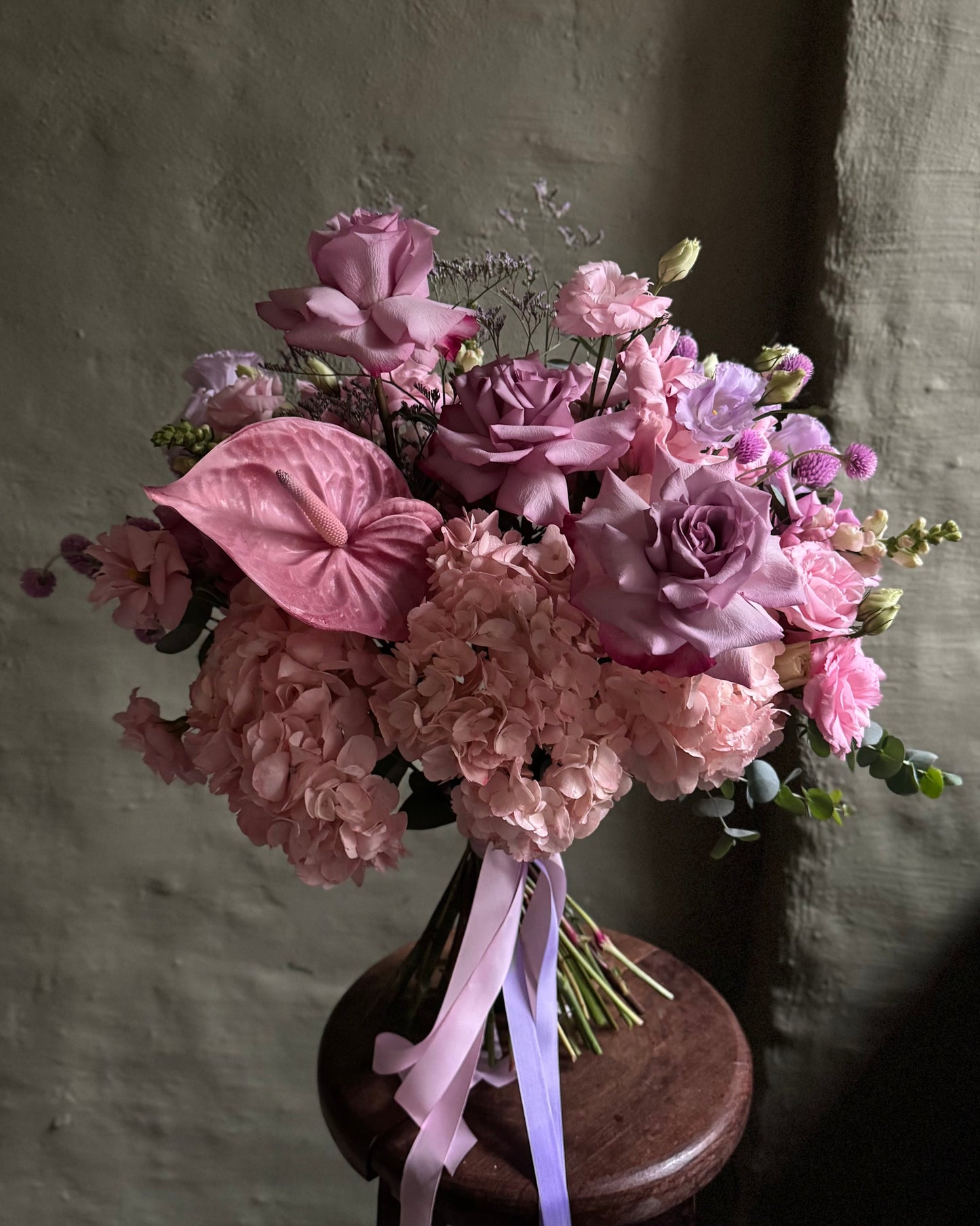 Pastel pink mixed flower hand-tied bouquet with anthurium