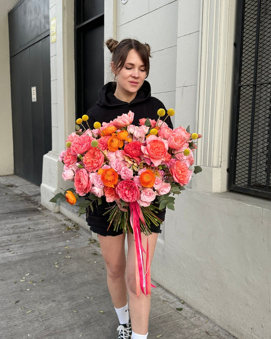 Hand-tied bouquet with spray and peony roses
