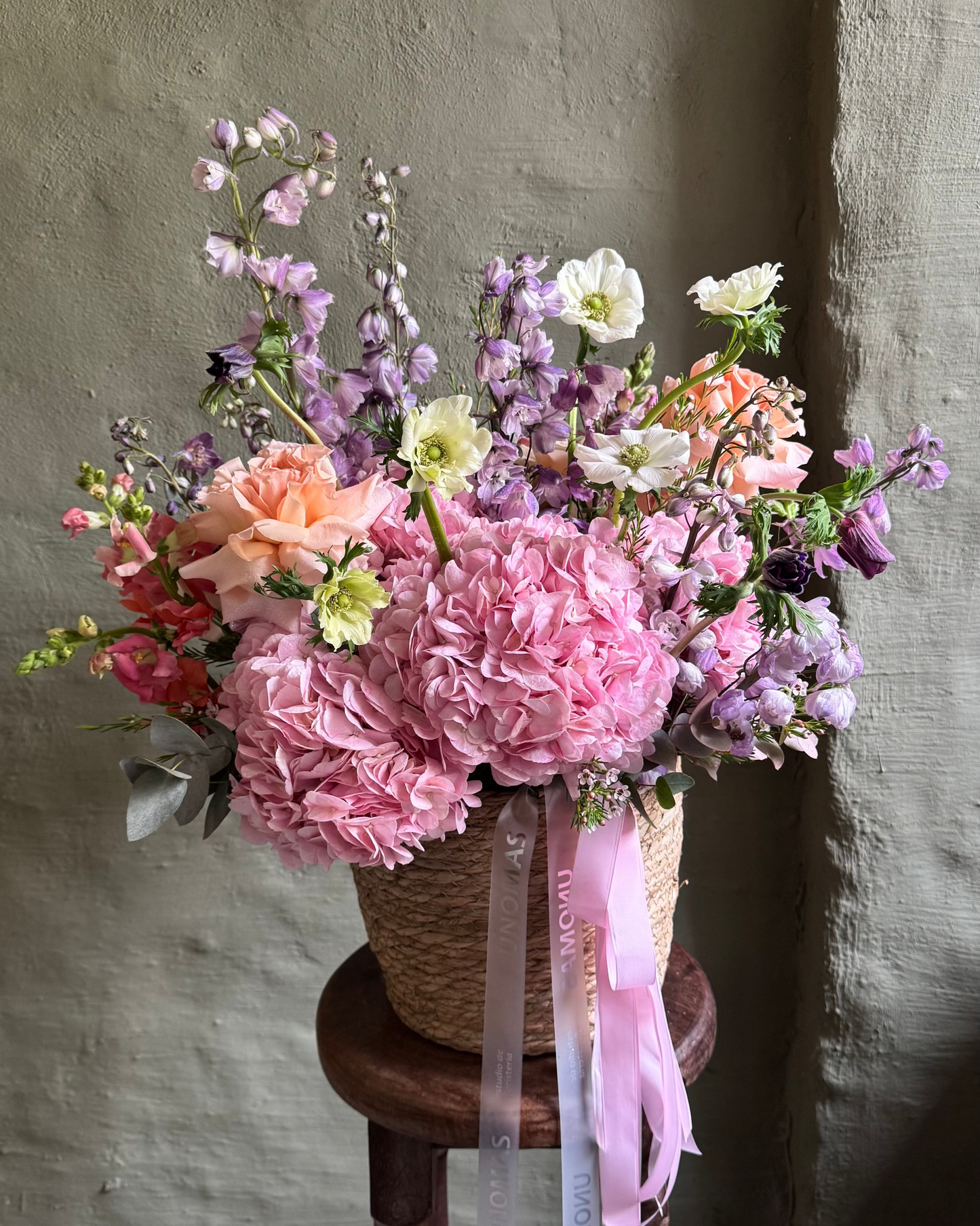 Floral arrangement fairytale pink & orange with hydrangeas & anemones