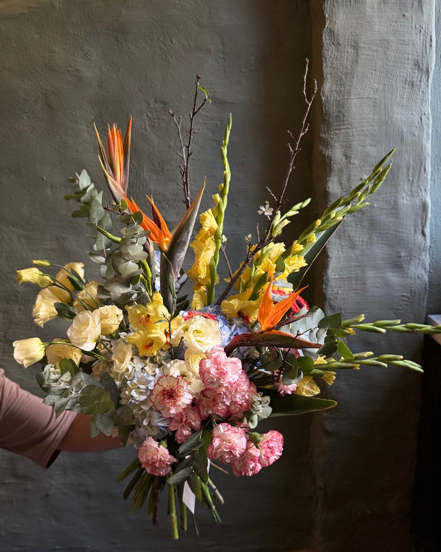 Big bright interior bouquet with strelitzias