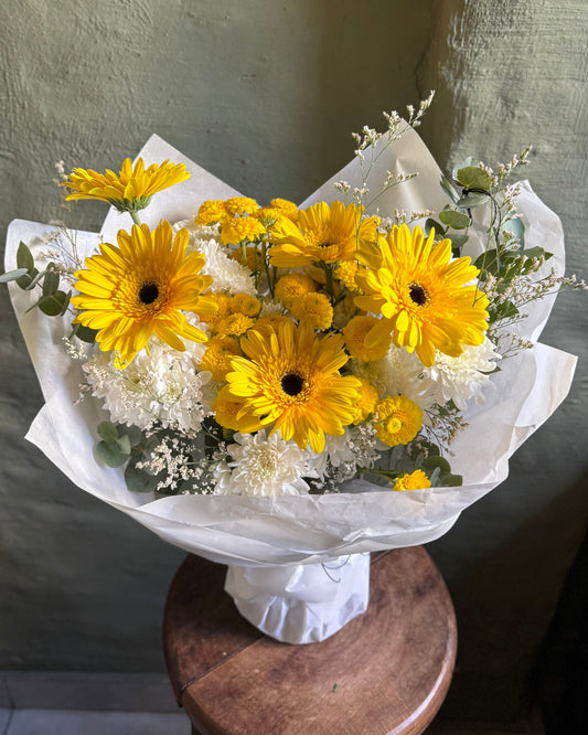 White & yellow interior mixed flower bouquet