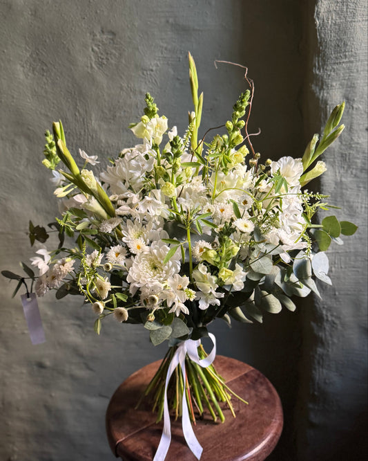 Field style bouquet with daffodils, antirrhinums, gladioli